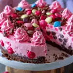 Pink M&M Snickers Cheesecake