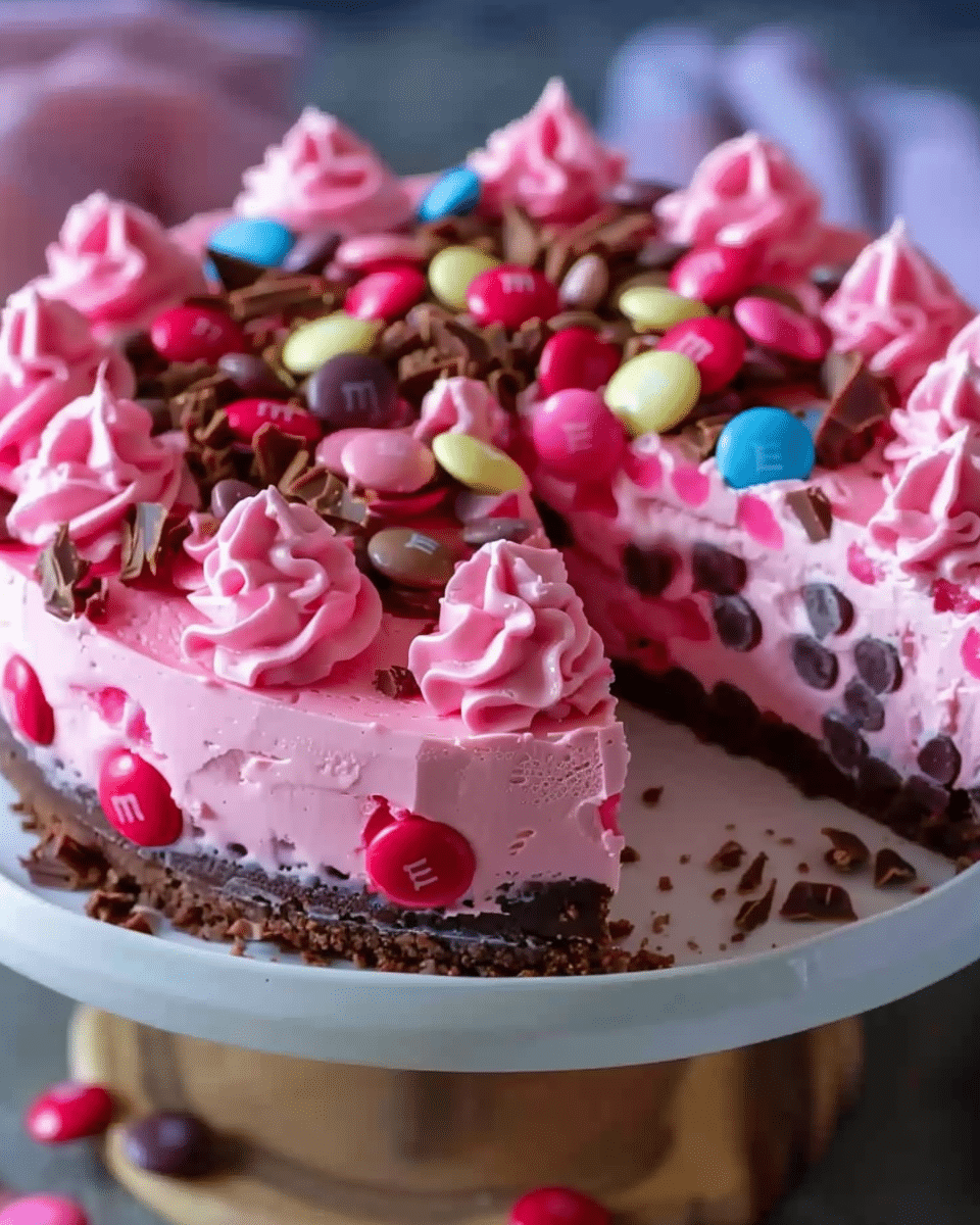 Pink M&M Snickers Cheesecake
