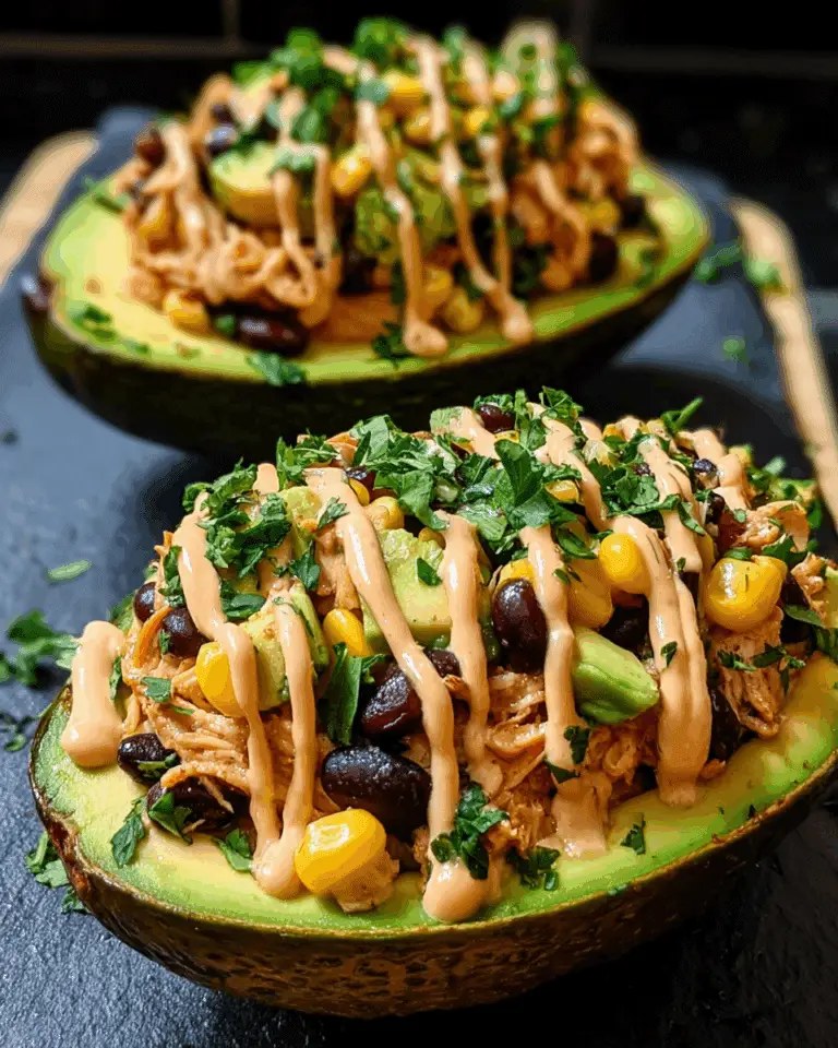 Honey Lime Chicken Stuffed Avocado Boats with Queso Drizzle