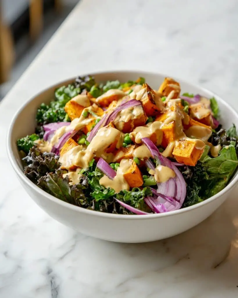 Kale Salad with Roasted Sweet Potatoes, Chickpeas, and Quinoa Recipe